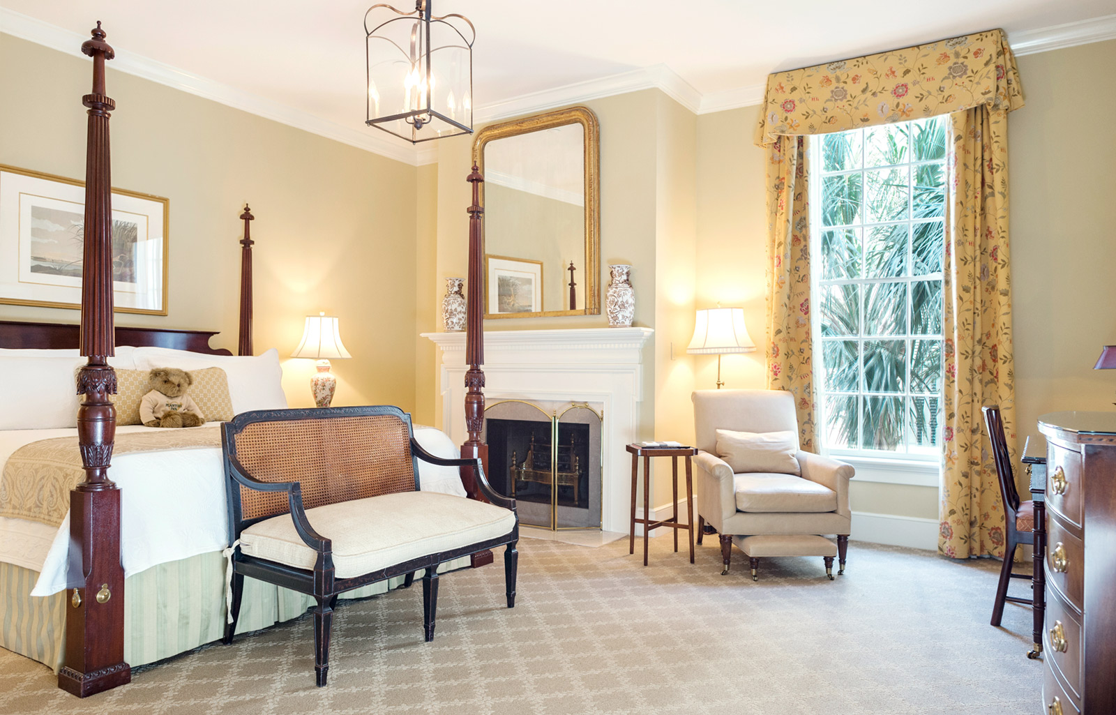 The Premier Grand King A Charleston SC hotel room with fireplace