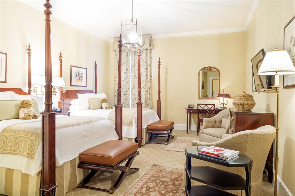 The Deluxe Double Queen charleston hotel room with two beds