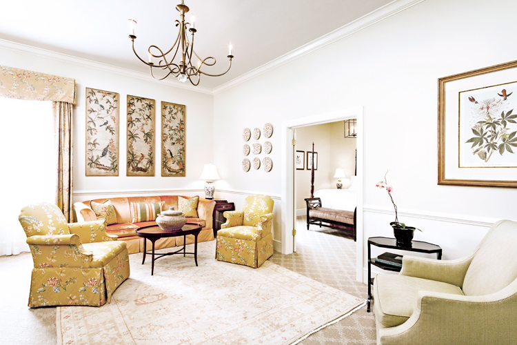 Charleston hotel suite with pull out sofa bed Living area of one of our luxury Charleston hotel suites