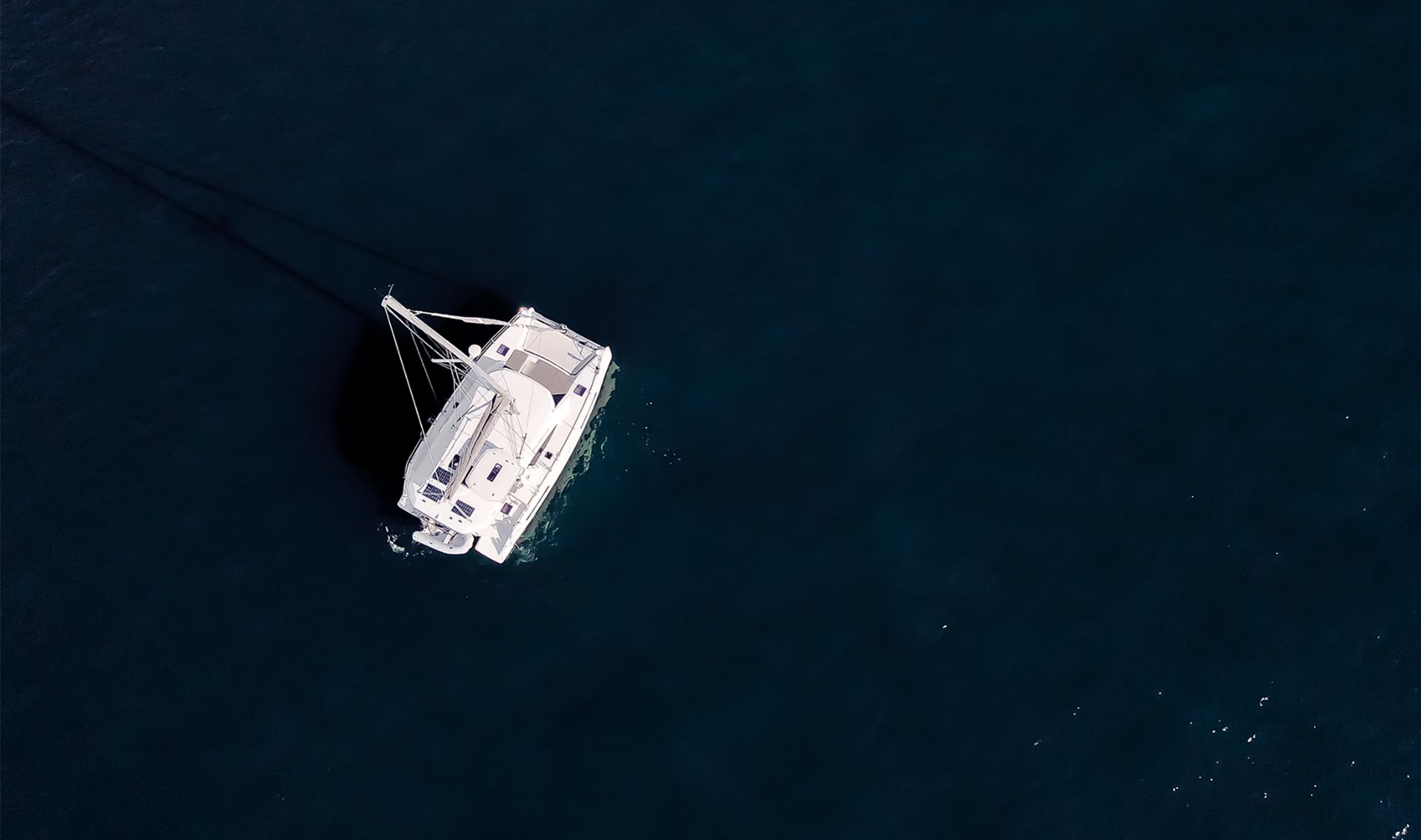 a white boat in the water